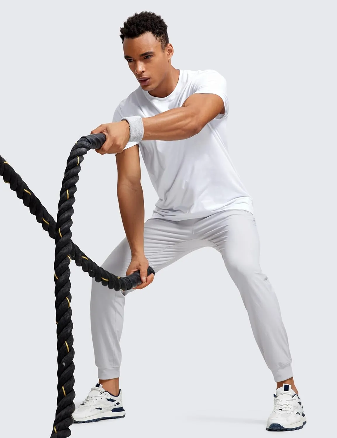 CRZ YOGA Athletic Joggers for Men 29"/31" Lightweight Water Resistant Outdoor Workout Pants with Zip Pockets