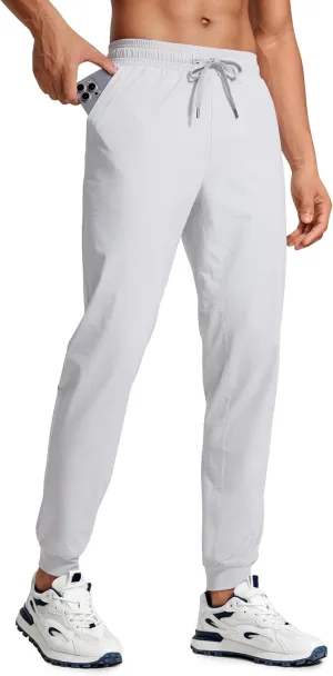 CRZ YOGA Athletic Joggers for Men 29"/31" Lightweight Water Resistant Outdoor Workout Pants with Zip Pockets